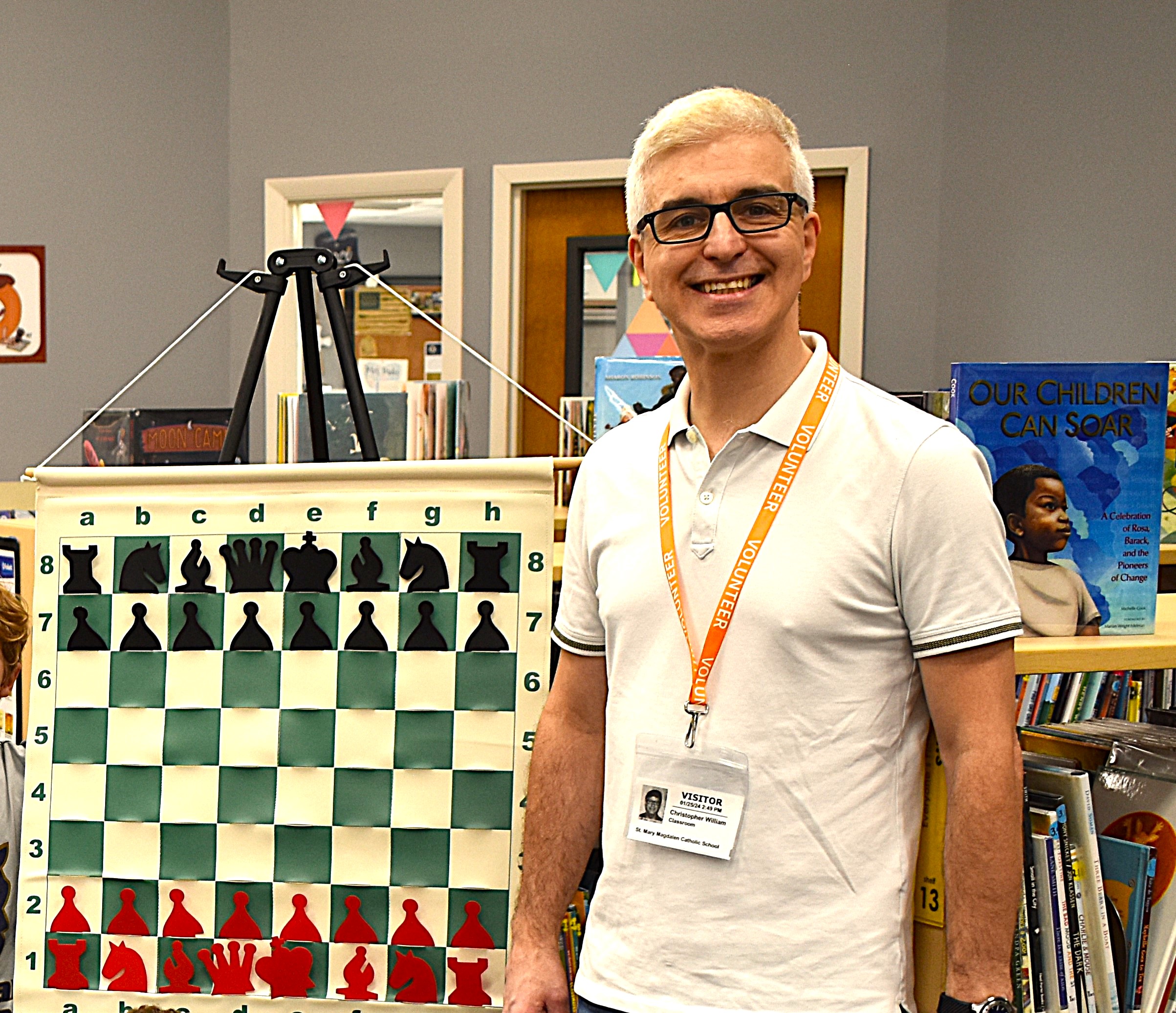 Coach Chris teaching chess